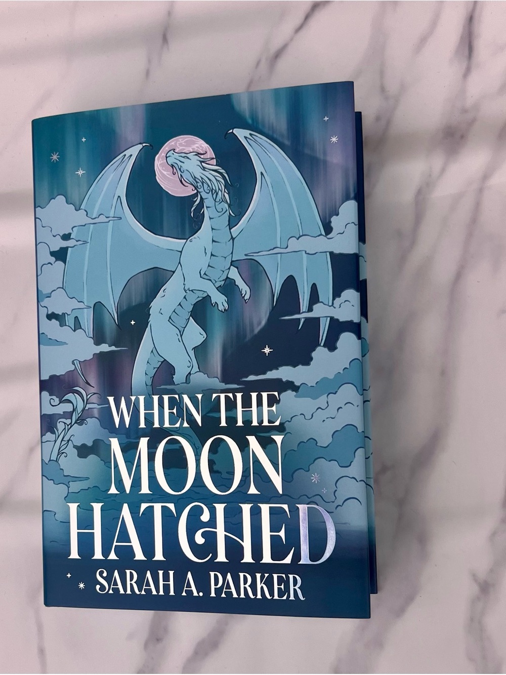 When the Moon Hatched by Sarah A. Parker - Blue Dragon Cover